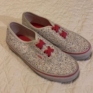 Vans pink and white glittered sneakers.